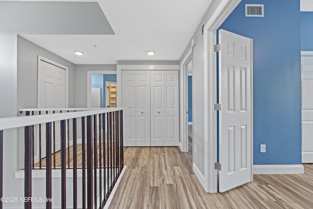 4000 Grande Vista Blvd Unit 15-106, Saint Augustine, FL 32084 - hallway with wood finished floors and baseboards