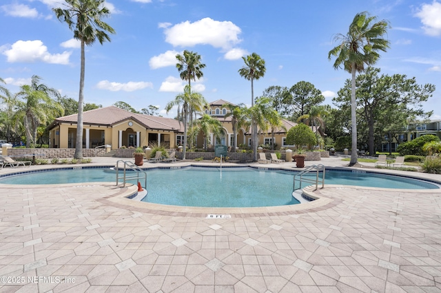 4000 Grande Vista Blvd Unit 15-106, Saint Augustine, FL 32084 - community pool featuring a patio