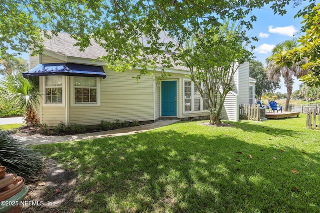 1430 Spindrift Cir E, Neptune Beach, FL 32266 - rear view of property with roof with shingles