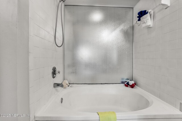 1430 Spindrift Cir E, Neptune Beach, FL 32266 - bathroom featuring a tub to relax in