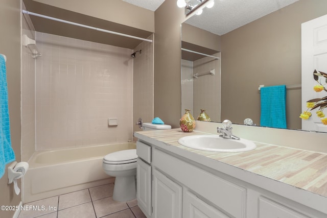 1430 Spindrift Cir E, Neptune Beach, FL 32266 - full bathroom with vanity, shower / tub combination, tile patterned floors, and a textured ceiling