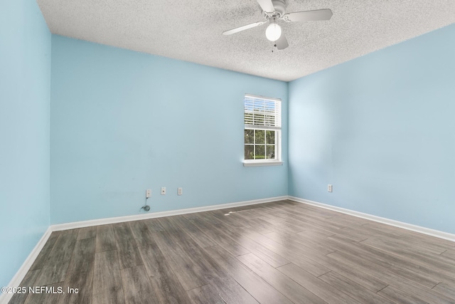1430 Spindrift Cir E, Neptune Beach, FL 32266 - empty room featuring wood finished floors, a ceiling fan, and a textured ceiling