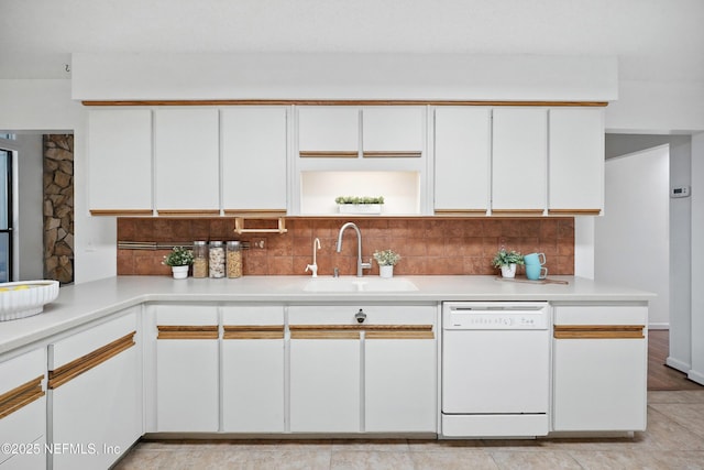 1918 Oak Cir, Atlantic Beach, FL 32233 - kitchen with dishwasher, decorative backsplash, and white cabinetry