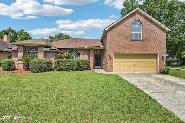 1400 Gibralter Ln, Fleming Island, FL 32003 - view of front of home featuring a garage, brick siding, concrete driveway, and a front lawn