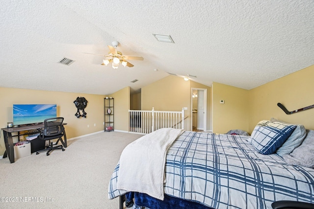 1400 Gibralter Ln, Fleming Island, FL 32003 - bedroom featuring vaulted ceiling, carpet flooring, a ceiling fan, and a textured ceiling