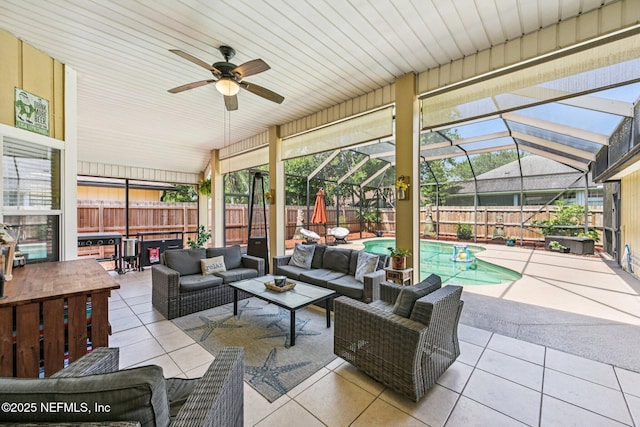 1400 Gibralter Ln, Fleming Island, FL 32003 - fenced backyard featuring an outdoor hangout area, a patio, ceiling fan, and a lanai
