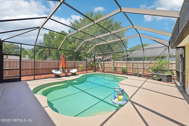 1400 Gibralter Ln, Fleming Island, FL 32003 - view of pool featuring a patio, a fenced backyard, and glass enclosure