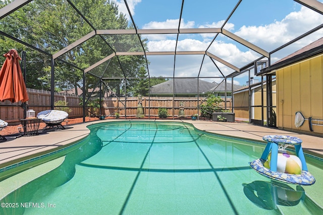 1400 Gibralter Ln, Fleming Island, FL 32003 - view of swimming pool with a fenced backyard, a patio, and glass enclosure