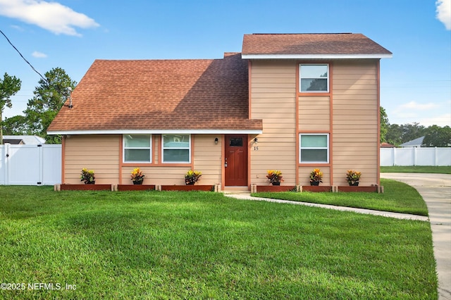 15 Katrina Pl, Palm Coast, FL 32164 - view of front facade with a shingled roof and a gate