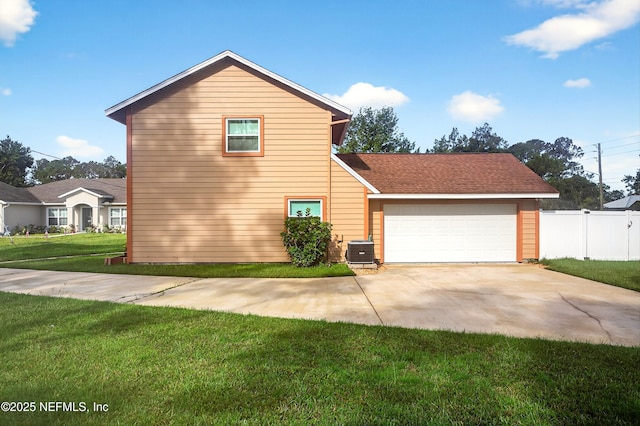 15 Katrina Pl, Palm Coast, FL 32164 - view of property exterior with an attached garage and concrete driveway