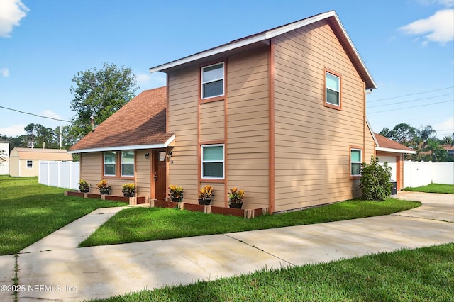 15 Katrina Pl, Palm Coast, FL 32164 - traditional home featuring driveway and a shingled roof
