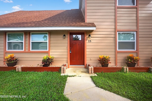 15 Katrina Pl, Palm Coast, FL 32164 - entrance to property featuring roof with shingles