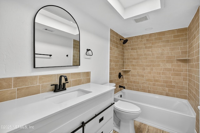 15 Katrina Pl, Palm Coast, FL 32164 - full bathroom with vanity, washtub / shower combination, tasteful backsplash, and wood finished floors