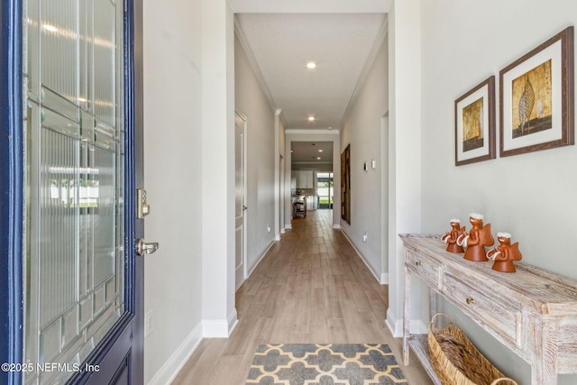 83316 Chapel Ct, Fernandina Beach, FL 32034 - foyer featuring light wood-style floors, ornamental molding, and recessed lighting