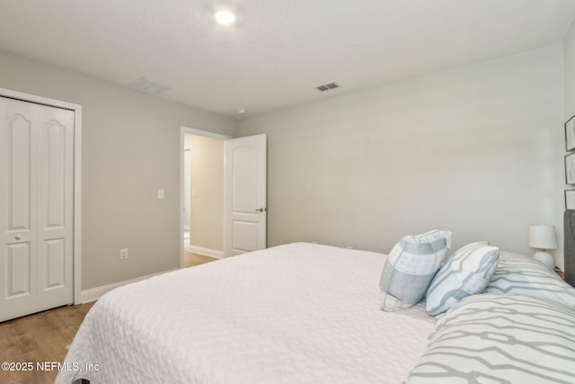 83316 Chapel Ct, Fernandina Beach, FL 32034 - bedroom featuring light wood-style floors and a closet
