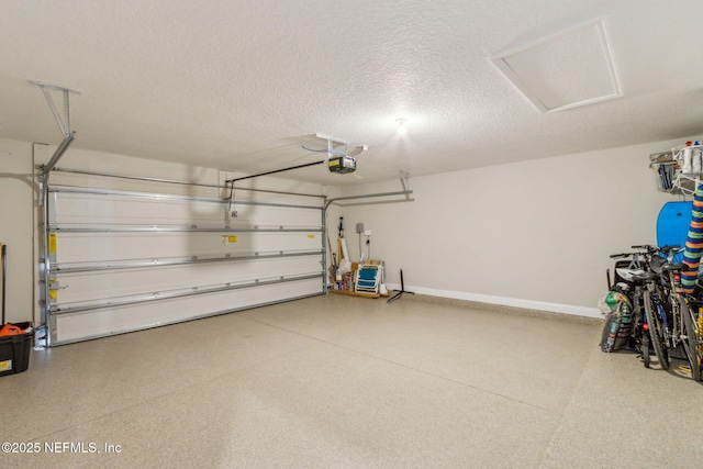 83316 Chapel Ct, Fernandina Beach, FL 32034 - garage with a garage door opener and baseboards
