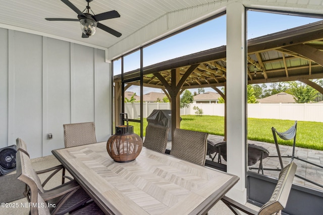 83316 Chapel Ct, Fernandina Beach, FL 32034 - sunroom / solarium with outdoor dining area and ceiling fan