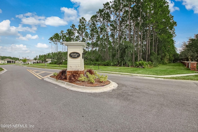 83316 Chapel Ct, Fernandina Beach, FL 32034 - view of asphalt street with curbs