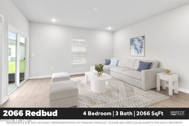 9018 Whinny Way Lot 276, Jacksonville, FL 32219 - living room featuring wood finished floors, healthy amount of natural light, and recessed lighting