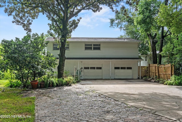 6241 Riviera Manor Dr, Jacksonville, FL 32216 - view of front of house with concrete driveway and a garage