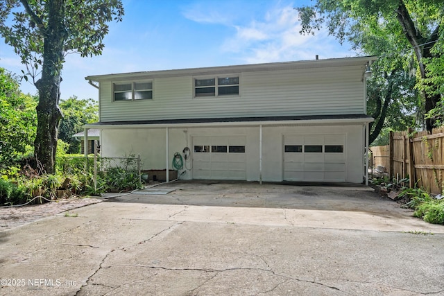 6241 Riviera Manor Dr, Jacksonville, FL 32216 - view of front of house with an attached garage and concrete driveway