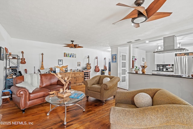 6241 Riviera Manor Dr, Jacksonville, FL 32216 - living room featuring ceiling fan and wood finished floors