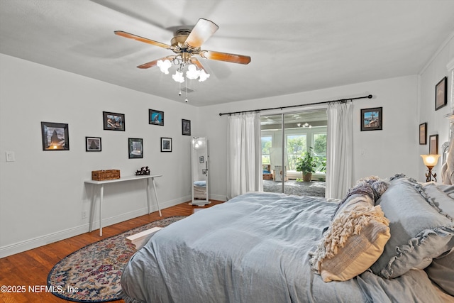 6241 Riviera Manor Dr, Jacksonville, FL 32216 - bedroom featuring access to exterior, wood finished floors, and a ceiling fan