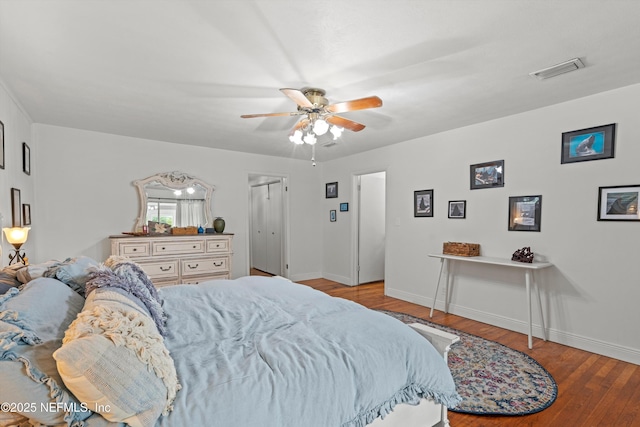 6241 Riviera Manor Dr, Jacksonville, FL 32216 - bedroom featuring wood finished floors and a ceiling fan