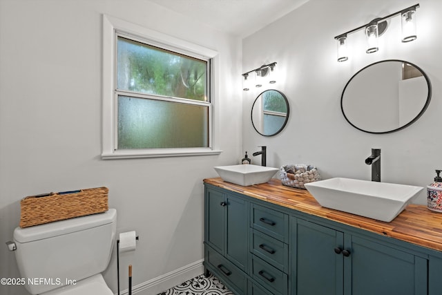 6241 Riviera Manor Dr, Jacksonville, FL 32216 - full bathroom with toilet and double vanity