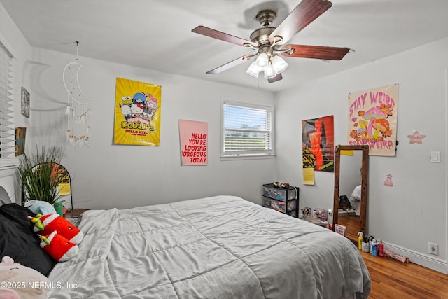 6241 Riviera Manor Dr, Jacksonville, FL 32216 - bedroom featuring wood finished floors and a ceiling fan
