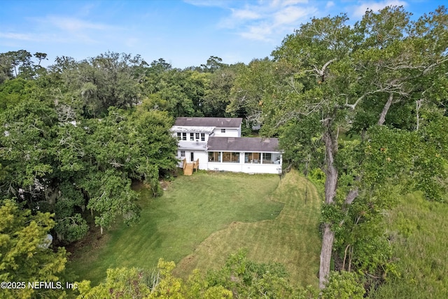 6241 Riviera Manor Dr, Jacksonville, FL 32216 - aerial view of property and surrounding area with a heavily wooded area