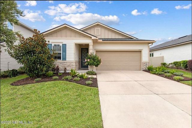 2972 Laurel Springs Dr, Green Cove Springs, FL 32043 - view of front of house featuring board and batten siding, stone siding, a garage, and concrete driveway