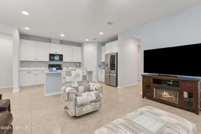 2972 Laurel Springs Dr, Green Cove Springs, FL 32043 - living area with light tile patterned flooring and recessed lighting