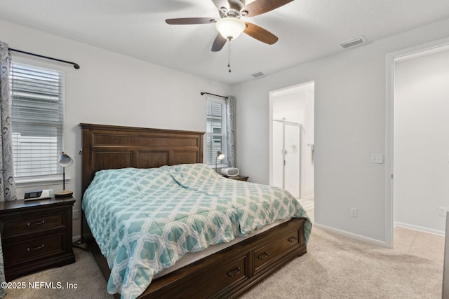 2972 Laurel Springs Dr, Green Cove Springs, FL 32043 - bedroom featuring light carpet, a ceiling fan, and ensuite bathroom