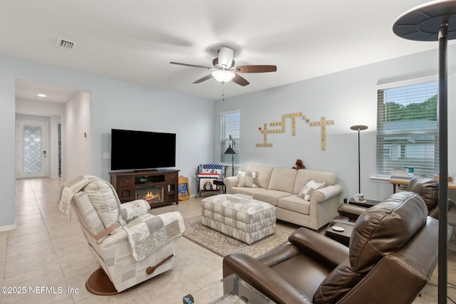 2972 Laurel Springs Dr, Green Cove Springs, FL 32043 - living area featuring ceiling fan, plenty of natural light, and light tile patterned flooring