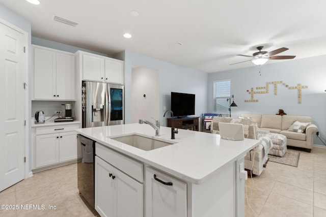 2972 Laurel Springs Dr, Green Cove Springs, FL 32043 - kitchen with stainless steel refrigerator with ice dispenser, open floor plan, light tile patterned floors, light countertops, and recessed lighting
