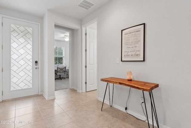 2972 Laurel Springs Dr, Green Cove Springs, FL 32043 - entryway featuring baseboards and light tile patterned flooring