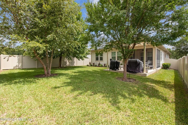 2972 Laurel Springs Dr, Green Cove Springs, FL 32043 - fenced backyard featuring a sunroom