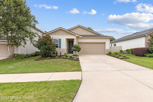 2972 Laurel Springs Dr, Green Cove Springs, FL 32043 - craftsman house featuring board and batten siding, stone siding, driveway, and an attached garage