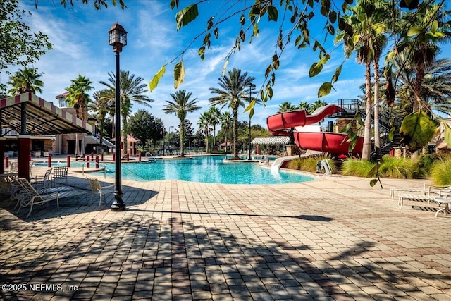 2972 Laurel Springs Dr, Green Cove Springs, FL 32043 - community pool with a water slide and a patio area
