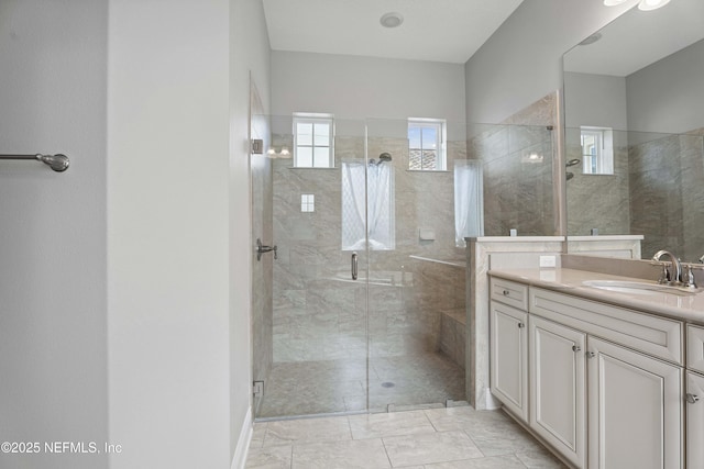 2936 Brettungar Dr, Jacksonville, FL 32246 - bathroom featuring vanity, a stall shower, and marble look tile flooring