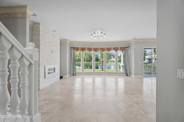 2936 Brettungar Dr, Jacksonville, FL 32246 - unfurnished living room featuring a water view, ornamental molding, and a fireplace