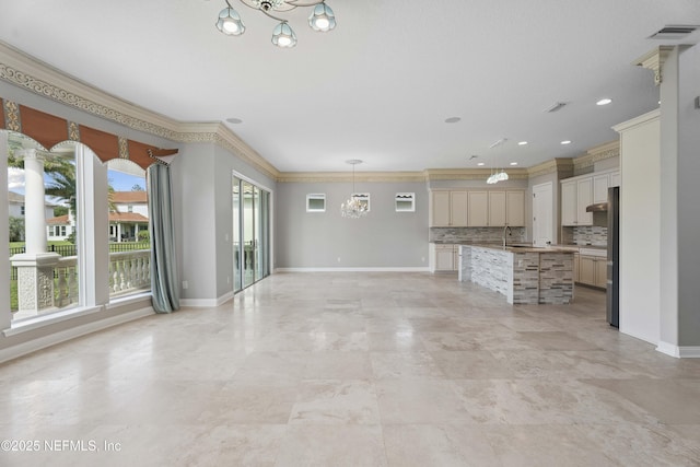 2936 Brettungar Dr, Jacksonville, FL 32246 - unfurnished living room with a chandelier and ornamental molding