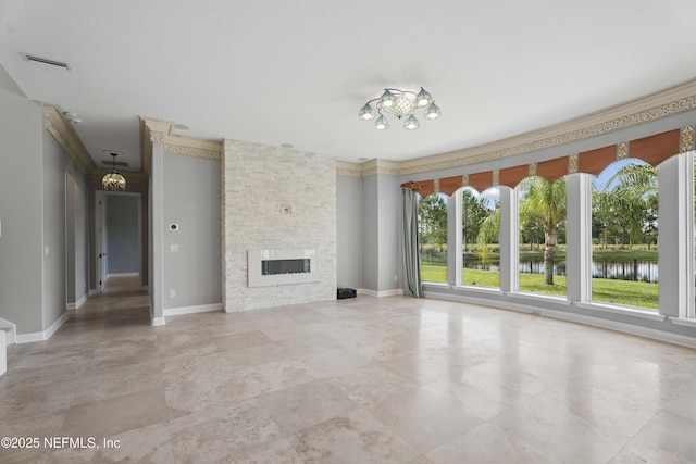 2936 Brettungar Dr, Jacksonville, FL 32246 - unfurnished living room featuring a water view, ornamental molding, and a stone fireplace