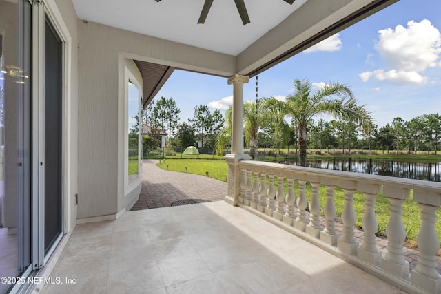 2936 Brettungar Dr, Jacksonville, FL 32246 - view of patio / terrace with ceiling fan and a water view