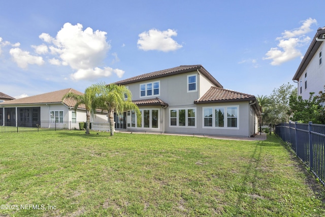 2936 Brettungar Dr, Jacksonville, FL 32246 - rear view of house featuring a tiled roof, a fenced backyard, and stucco siding