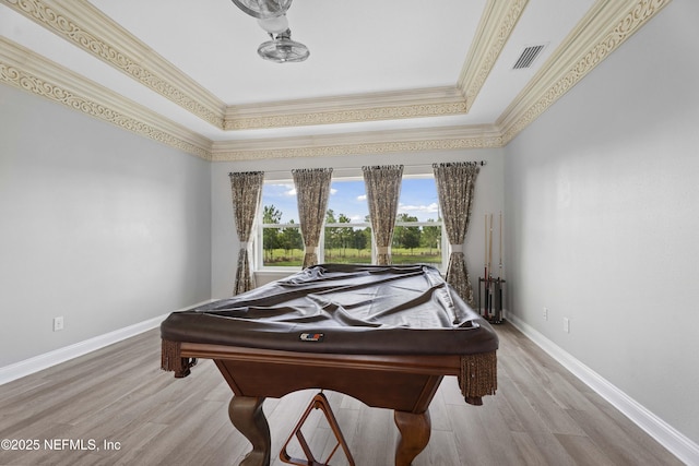 2936 Brettungar Dr, Jacksonville, FL 32246 - recreation room with light wood-style floors, crown molding, and a raised ceiling
