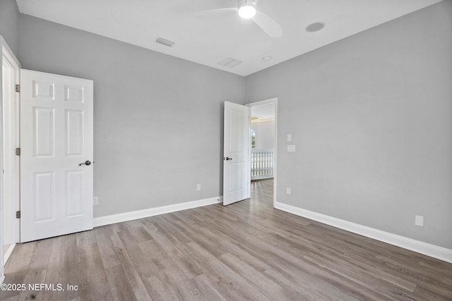 2936 Brettungar Dr, Jacksonville, FL 32246 - unfurnished bedroom with wood finished floors and a ceiling fan