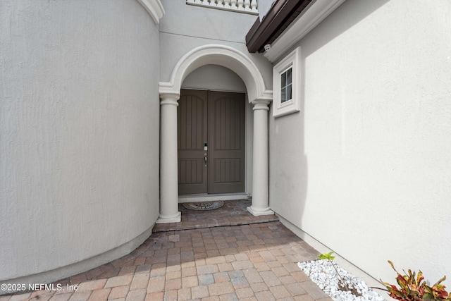 2936 Brettungar Dr, Jacksonville, FL 32246 - property entrance with stucco siding