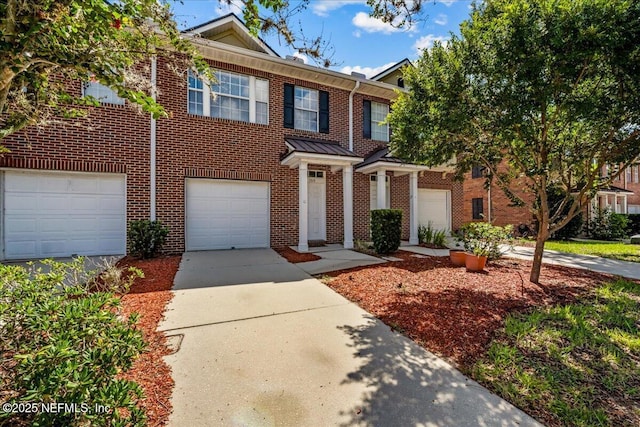 1515 Landau Rd, Jacksonville, FL 32225 - view of front of property featuring brick siding, an attached garage, concrete driveway, and a standing seam roof